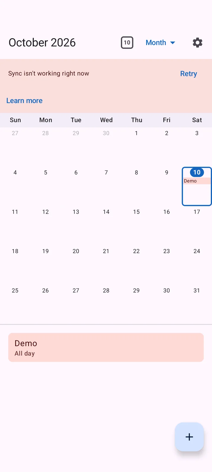 Android sync problem banner with retry and help actions above the calendar.